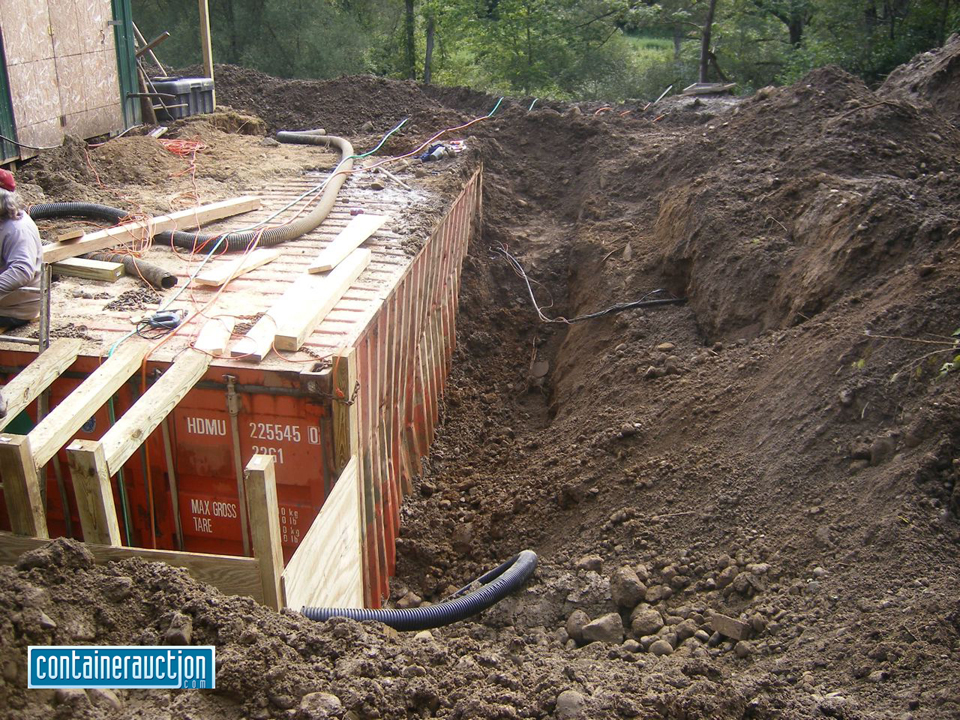 What happens when you bury a shipping container, a cautionary tale.